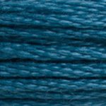 A close-up view of embroidery thread skeins, held taught horizontally. The shade is a deep blue-green, like a swimming pool at night