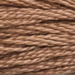 A close-up view of embroidery thread skeins, held taught horizontally. The shade is a light brown tan, like sun-bleaching wood