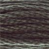 A close-up view of embroidery thread skeins, held taught horizontally. The shade is a dark grey-green