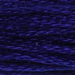 A close-up view of embroidery thread skeins, held taught horizontally. The shade is a deep indigo, almost verging into black.