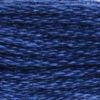 A close-up view of embroidery thread skeins, held taught horizontally. The shade is a dusky blue, like the evening sky turning to night.