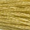 A close-up view of embroidery thread skeins, held taught horizontally. The shade is a light yellow, like cornsilk