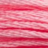 A close-up view of embroidery thread skeins, held taught horizontally. The shade is a bright, saturated pink, like handmade strawberry ice cream.