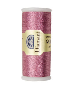 A tall spool of shiny, shell pink floss with a gold band around the centre with the DMC logo in blue and Diamant in black letters