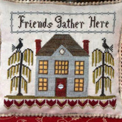 A cross stitched blue mansion with stylised trees with birds on top and the words friends gather here at the top