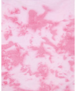A sheet of hand-dyed fabric, mostly light pink, with mottling of dark pink