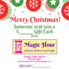 A Christmas Gift card, with bright red and green balls at the top