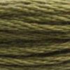 A close-up view of embroidery thread skeins, held taught horizontally. The shade is a medium dark greenish brown, like dry moss