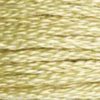 A close-up view of embroidery thread skeins, held taught horizontally. The shade is a medium light golden yellow-tan, like dry wheat