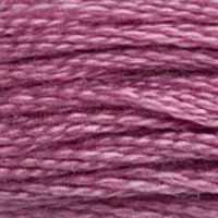 A close-up view of embroidery thread skeins, held taught horizontally. The shade is a beautiful earth tone in medium pinkish purple, like black cherry ice cream.