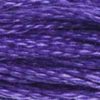A close-up view of embroidery thread skeins, held taught horizontally. The shade is a medium dark bluish purple shade, like the petals of a violet.