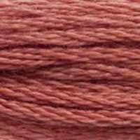 A close-up view of embroidery thread skeins, held taught horizontally. The shade is a medium dusty rose pink with a hint of orangey brown undertone, like a rose going into autumn. 