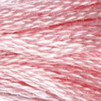 A close-up view of embroidery thread skeins, held taught horizontally. The shade is a medium light pretty pink, a bit stronger than baby pink