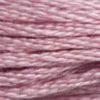 A close-up view of embroidery thread skeins, held taught horizontally. The shade is a light pretty dusty purple