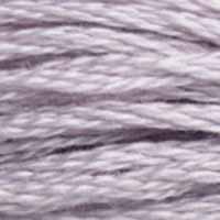 A close-up view of embroidery thread skeins, held taught horizontally. The shade is a very light purple, almost off-white