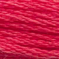 A close-up view of embroidery thread skeins, held taught horizontally. The shade is a bright light red, like watermelon