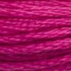 A close-up view of embroidery thread skeins, held taught horizontally. The shade is a beautiful medium bright pink that leans towards purple. This is one of my favourites!