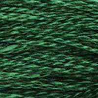 A close-up view of embroidery thread skeins, held taught horizontally. The shade is a beautiful deep dark pure green