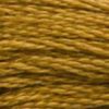 A close-up view of embroidery thread skeins, held taught horizontally. The shade is a medium dark golden brown with a touch of yellow