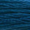 A close-up view of embroidery thread skeins, held taught horizontally. The shade is a beautiful dark blue in the classic Wedgewood blue shade