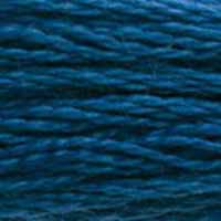 A close-up view of embroidery thread skeins, held taught horizontally. The shade is a beautiful dark blue in the classic Wedgewood blue shade