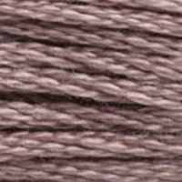 A close-up view of embroidery thread skeins, held taught horizontally. The shade is a medium pinkish brown with just a hint of mauve