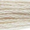 A close-up view of embroidery thread skeins, held taught horizontally. The shade is another very light off-white that has just a tiny hint of tan