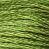 A close-up view of embroidery thread skeins, held taught horizontally. The shade is a medium green, one of the most commonly used colours. Shades beautifully with #469 Avocado Green. Like blades of crabgrass.