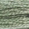 A close-up view of embroidery thread skeins, held taught horizontally. The shade is a medium green shade with grey overtones, like sagebrush in the snow.