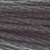 A close-up view of embroidery thread skeins, held taught horizontally. The shade is a medium dark true grey shade, like a shaggy old Irish Wolfhound