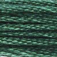 A close-up view of embroidery thread skeins, held taught horizontally. The shade is a medium dark beautiful green with just a hint of blue, like a pine tree in winter