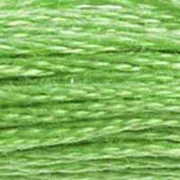 A close-up view of embroidery thread skeins, held taught horizontally. The shade is a bright light green, like the stems of spring flower-crown