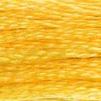 A close-up view of embroidery thread skeins, held taught horizontally. The shade is a bright pretty true yellow, not too intense, like a sunflower ripening for fall