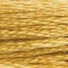A close-up view of embroidery thread skeins, held taught horizontally. The shade is a medium golden yellow like the lightest brown sugar
