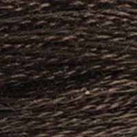 A close-up view of embroidery thread skeins, held taught horizontally. The shade is a deep dark brown bordering on black, like thick, rich garden compost