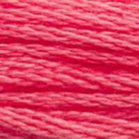 A close-up view of embroidery thread skeins, held taught horizontally. The shade is a pretty bright medium light pink with just a hint of yellow undertone, like the flesh of a ripe black plum