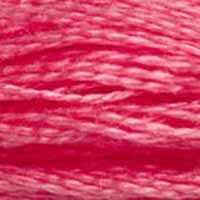 A close-up view of embroidery thread skeins, held taught horizontally. The shade is a pretty bright light pink with just a hint of yellow undertone, like raspberry jelly