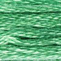 A close-up view of embroidery thread skeins, held taught horizontally. The shade is a pretty light green, slightly creamy, like shiny skin of a tropical tree frog