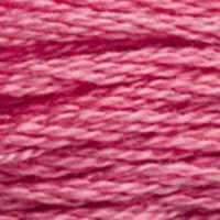 A close-up view of embroidery thread skeins, held taught horizontally. The shade is a medium dark bright pink, like raspberry sherbet 