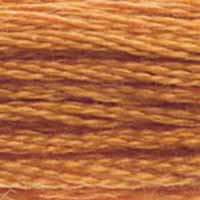 A close-up view of embroidery thread skeins, held taught horizontally. The shade is a medium brown with a golden touch, like dark brown sugar