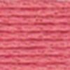 A close-up view of embroidery thread skeins, held taught horizontally. The shade is a rosy, blushing, peach colour