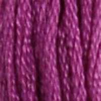 A close-up view of embroidery thread skeins, held taught vertically. The shade is a dark magenta