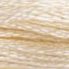 A close-up view of embroidery thread skeins, held taught horizontally. The shade is a very light tan off-white