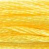 A close-up view of embroidery thread skeins, held taught horizontally. The shade is a light lemon yellow, not too intense, like a banana cream Popsicle