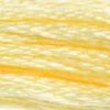 A close-up view of embroidery thread skeins, held taught horizontally. The shade is a very light yellow, almost off-white, like lemon meringue pie
