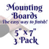 A white square with a faint image of a person's hands using a mounting board. Text in front of it reads, "Mounting Boards, The easy way to finish! 5 inches by 7 inches 3-pack"