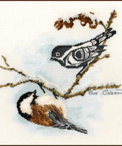 A chickadee clings to the bottom of a snowy branch. A Native-style line-art bird perches higher on the branch, looking down.