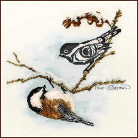 A chickadee clings to the bottom of a snowy branch. A Native-style line-art bird perches higher on the branch, looking down.