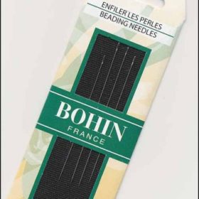 A cardboard packet containing four beading needles. The package text reads, "Bohin France, 10/12"
