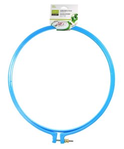 A large plastic embroidery hoop closed with a small metal bolt and screw